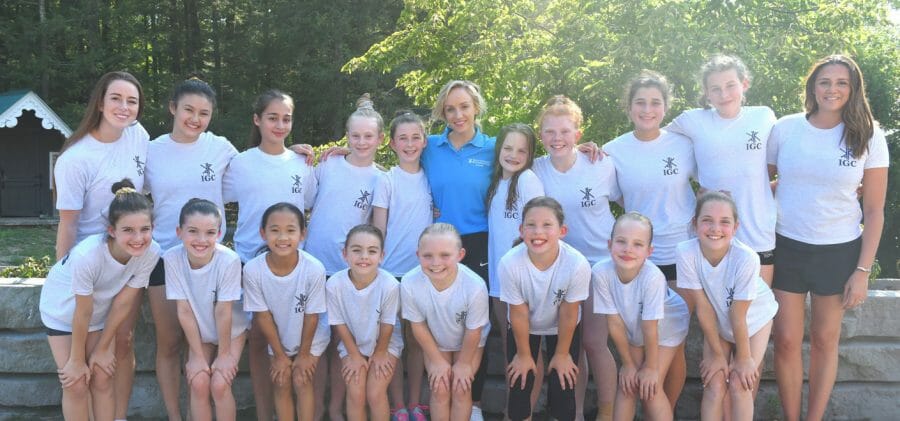 Celebrity guest Nastia Liukin posing with campers