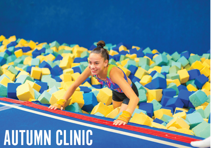 girl climbing out of a foam pit
