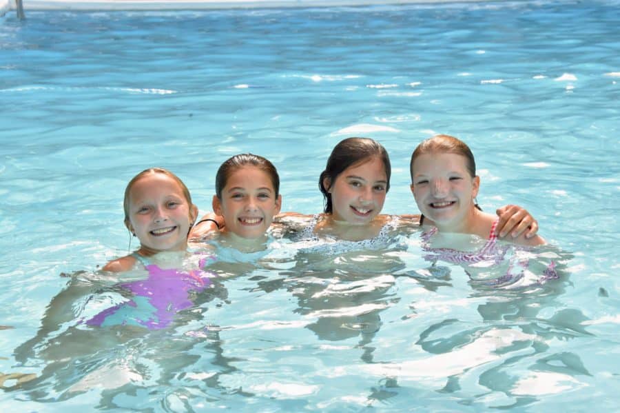 4 girls swimming