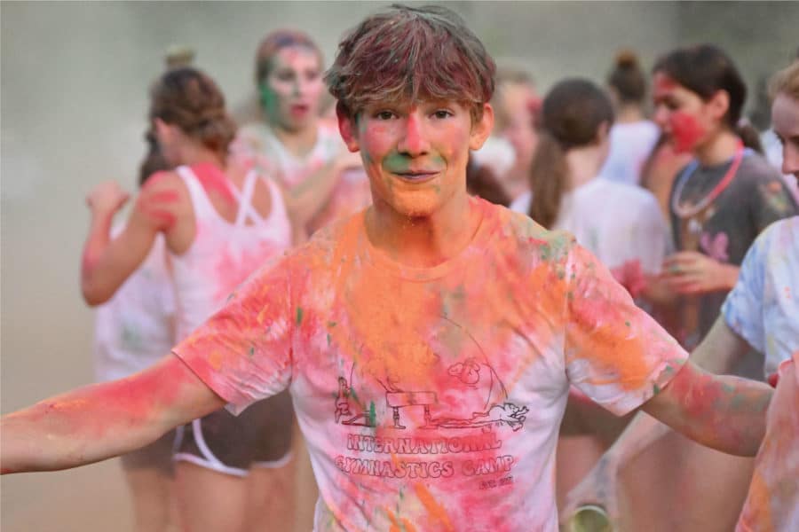 boy covered from color war